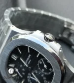 Close-up of the case and crown on the Nautilus 5712/1A-001, emphasizing its stainless-steel construction and fine surface finishing.