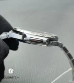 Macro view of the Nautilus 5712/1A-001 lugs, highlighting the precise case geometry and polished bevels contrasting with brushed steel.