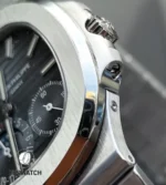 Detailed view of the lugs and crown of the Nautilus 5712/1A-001, showing the sharp bevels, satin-brushed surfaces, and screw-down crown.