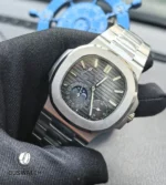 showing the brushed stainless-steel case, rounded octagonal bezel, and integrated bracelet.