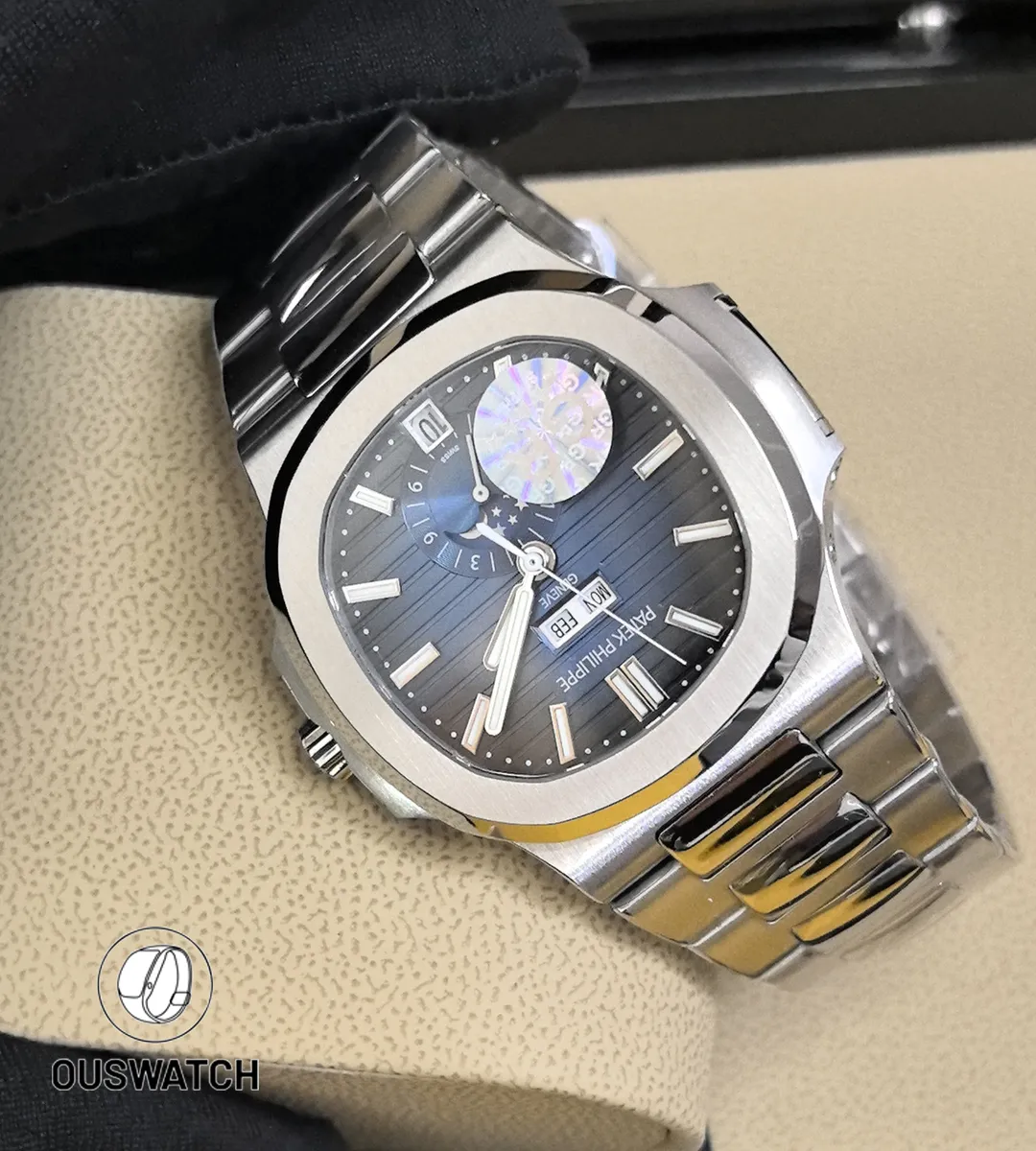 Patek Philippe Nautilus 5726/1A shown at a 45 degree angle, emphasizing the stainless-steel case structure, octagonal bezel, and blue gradient dial.