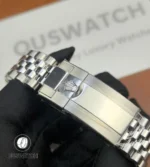 Close-up of the 904L stainless steel clasp on Rolex GMT-Master II 126710BLRO-0001.