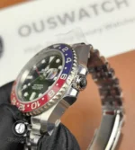 Stainless steel case and crown of Rolex GMT-Master II 126710BLRO-0001 — side profile detail.