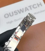 Folded deployment clasp opened on Rolex GMT-Master II 126710BLRO-0001 showing extension mechanism.