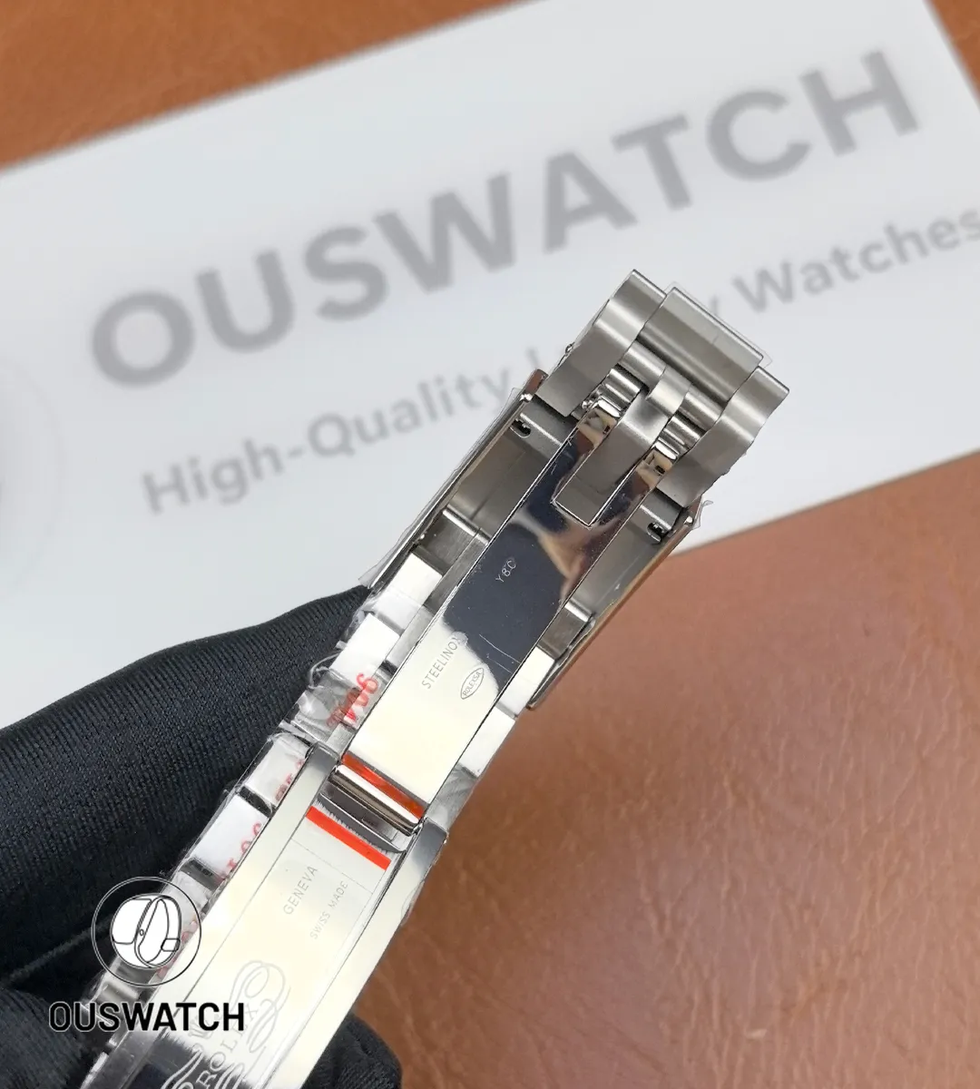 Folded deployment clasp opened on Rolex GMT-Master II 126710BLRO-0001 showing extension mechanism.