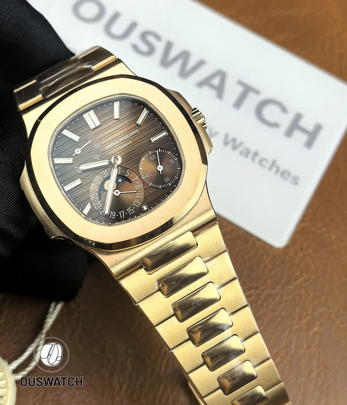 110° angled overview capturing dial, bezel curvature and bracelet flow in a single composed shot of the 5712R.