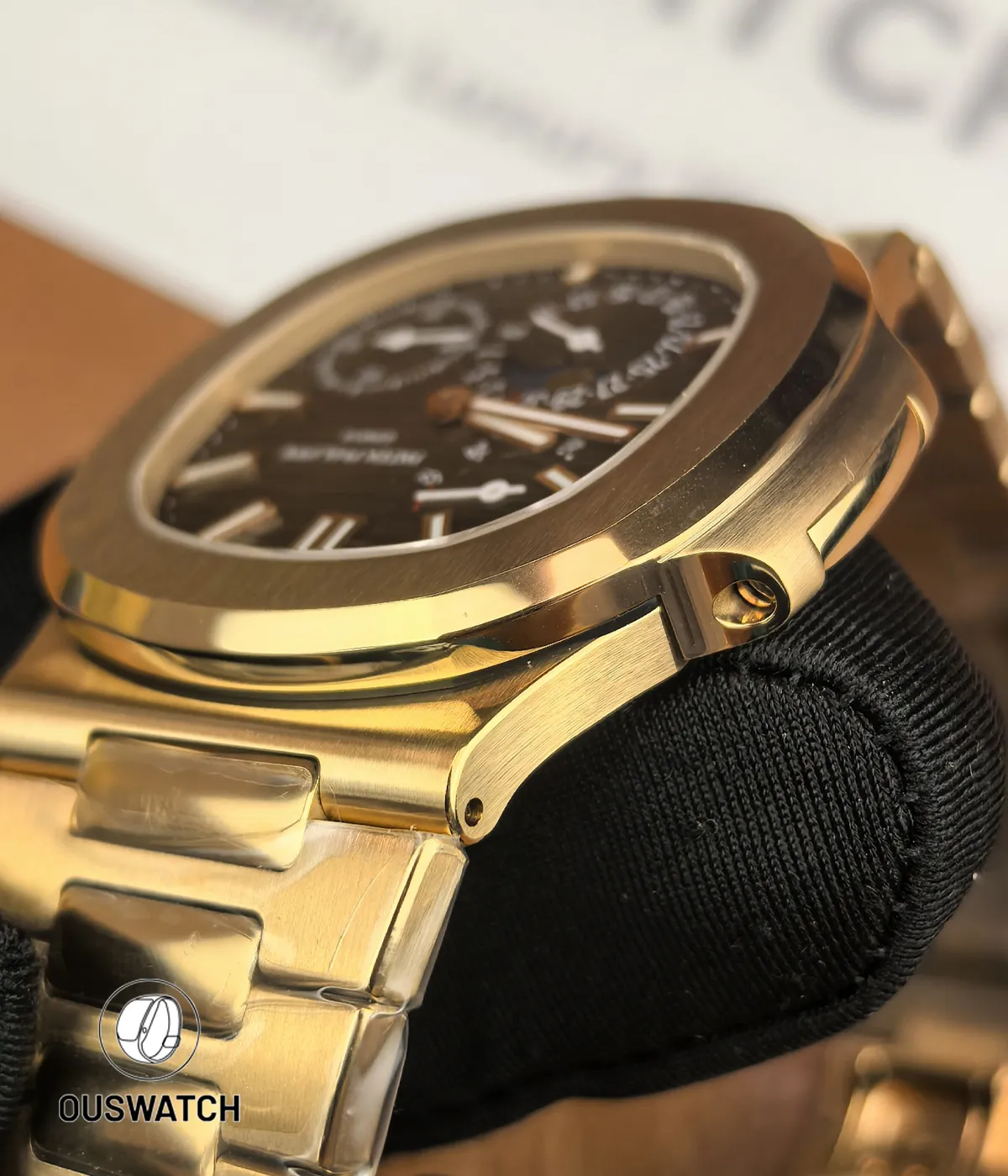 Close view of the lug-to-link junction where the case meets the integrated bracelet, highlighting seamless fit and finishing.
