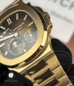 Tight study of the rose-gold case edge and polished chamfers on the Nautilus 5712R, showing fine surface textures.