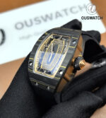 45° angled shot of the RM 07-01 showing case curvature, lug flow and how the rose gold catches studio light.