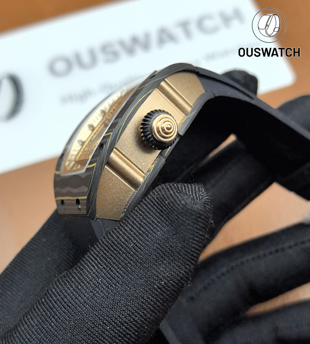 Macro of the rose gold case and signed crown on the RM 07-01, emphasizing knurling detail and polished chamfers.