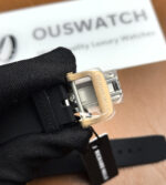 Rose-gold pin buckle close-up for the RM 07-01, focusing on polished pin geometry and embossed branding.