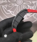 Side profile of the RM 35-02 Black Carbon TPT case showing the matte texture, case curvature and lug integration.