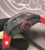 Detailed view of the RM 35-02 Black Quartz-TPT case and signed crown, showing composite layers and precision machining.