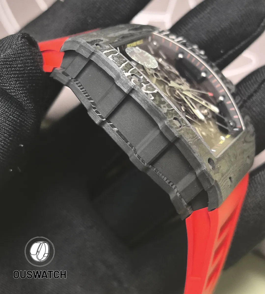 Macro close-up of the Carbon TPT case on the RM 35-02, highlighting the distinctive striated carbon pattern and edge finish.