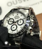 Detail of the black ceramic bezel and chronograph pushers on Rolex 116500LN-0002.