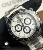 Close-up of Rolex 116500LN white dial showing subdials and applied markers.