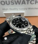 Macro close-up of the fluted bezel grooves, showing the faceted cuts and how they catch light.