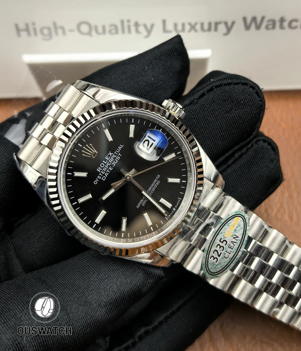 Watch presented in the palm to show scale and tactile finish of the Datejust 36mm.