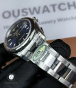 Stainless steel Oyster bracelet of the Datejust 126200, showing brushed outer links and polished center links.