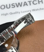 Folding clasp fully opened on the Datejust 126200 to display the inner mechanism and high-polish finish.