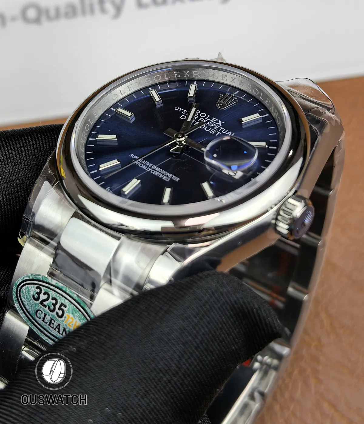 Detailed case shot of the Datejust 36mm 126200 emphasizing curvature and robust Oystersteel construction.