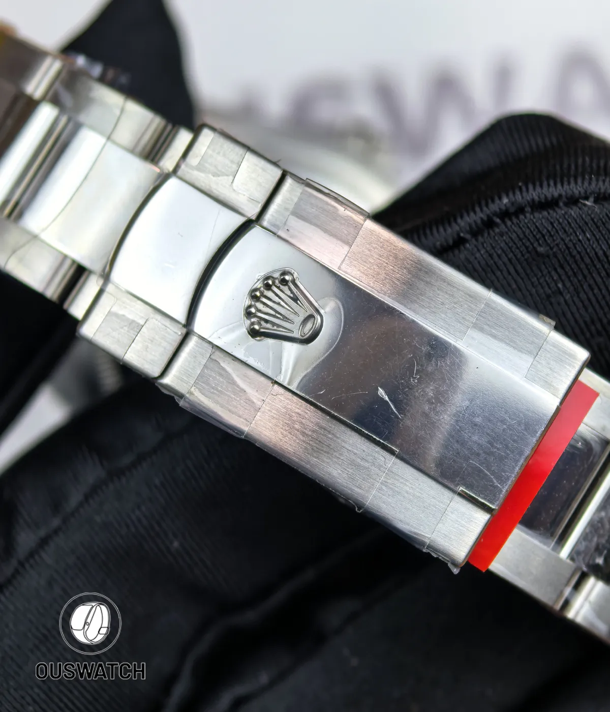 Secure Oysterclasp of the 126200 in brushed stainless steel, demonstrating the solid build and subtle logo.