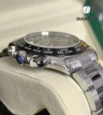 Close-up of Rolex Daytona 116500LN-0002 pushers and stainless steel case