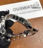 Close-up of the Oystersteel folding clasp on Rolex Daytona 126500LN.