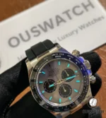 Rolex Daytona Ghost 126519LN-0006 white gold on Oysterflex strap shown in low-light conditions.