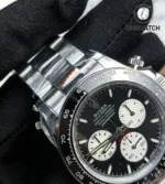 White gold case and black bezel of the Rolex Daytona Le Mans 126529LN-0001, side view.