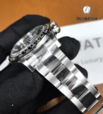 Rolex Daytona stainless steel bracelet display showing links and finish.