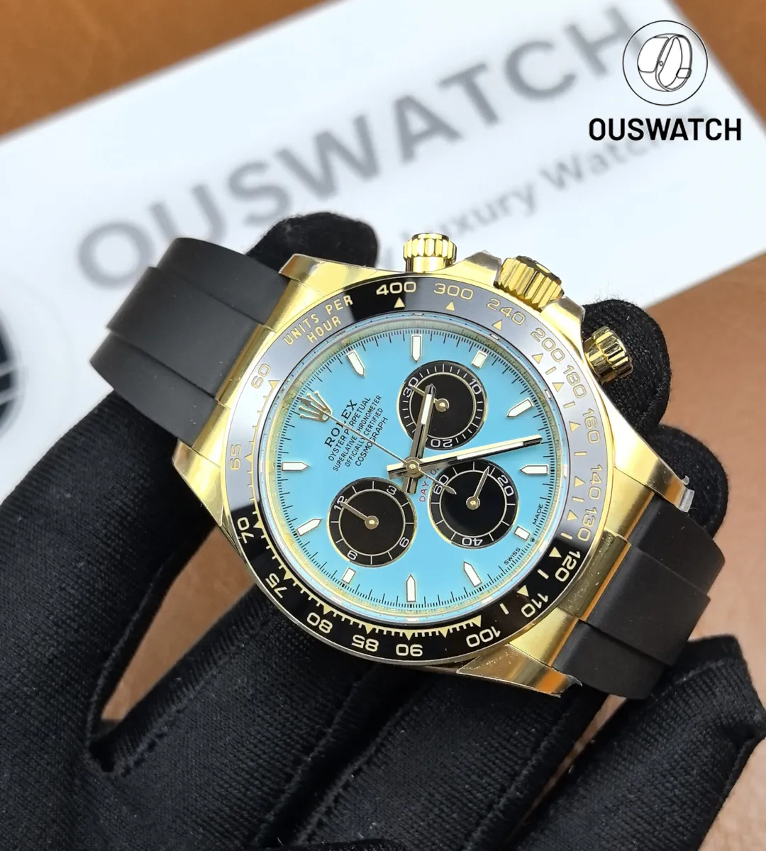 Rolex Daytona 126518LN yellow gold Tiffany blue dial shown at a 130° angle.