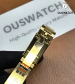 Unfolded view of the clasp on Rolex Daytona 126518LN yellow gold Tiffany blue.