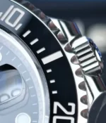 Macro view of the Deepsea case and screw-down crown revealing machining lines and crown-guard geometry.