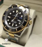 75° angled view emphasizing the deep black dial textures and applied hour markers on the 126603.