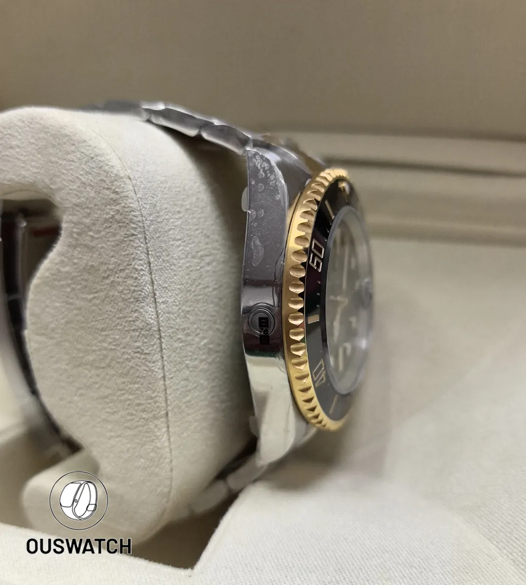 Side profile of the two-tone Deepsea 126603, contrasting polished gold accents with brushed steel surfaces.