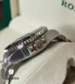 Macro of the case flank and screw-down crown for the 136660, showing machining lines and crown guard shape.