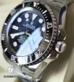 Close-up of the black ceramic bezel on the 136660 with engraved diving scale and crisp edgework.