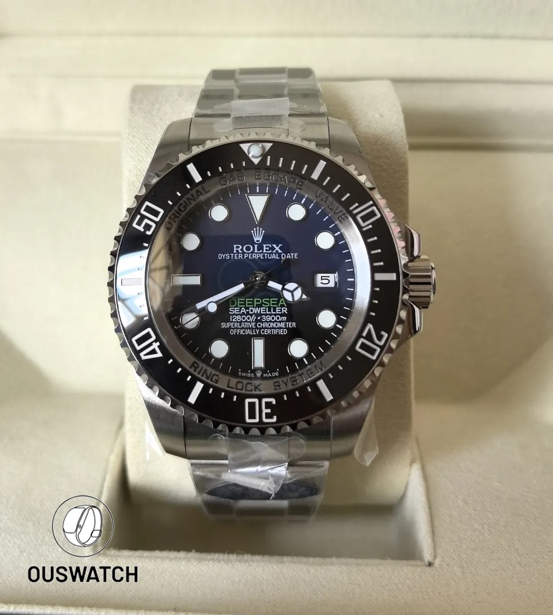 Rolex Deepsea 136660 displayed front-facing in its box — a composition that emphasizes presentation and scale.