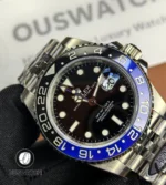 130° front-angle view of Rolex GMT-Master II 126710BLNR highlighting the black dial and bezel.
