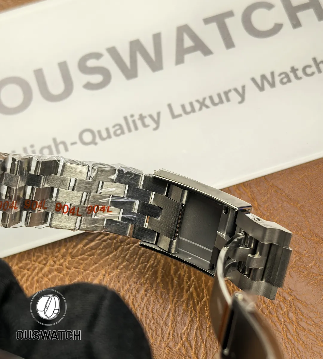 Clasp detail of Rolex GMT-Master II 126710BLNR Jubilee bracelet showing finish and engraving.