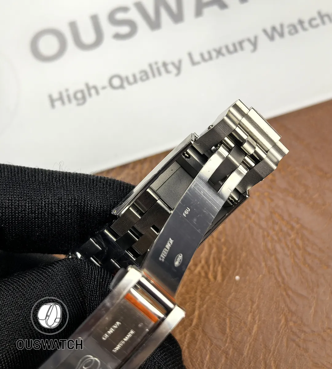 Fully unfolded folding clasp of the Rolex GMT-Master II 126710BLNR Jubilee bracelet.