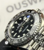 Bezel and stainless steel case detail of the Rolex GMT-Master II 126710GRNR-0003.