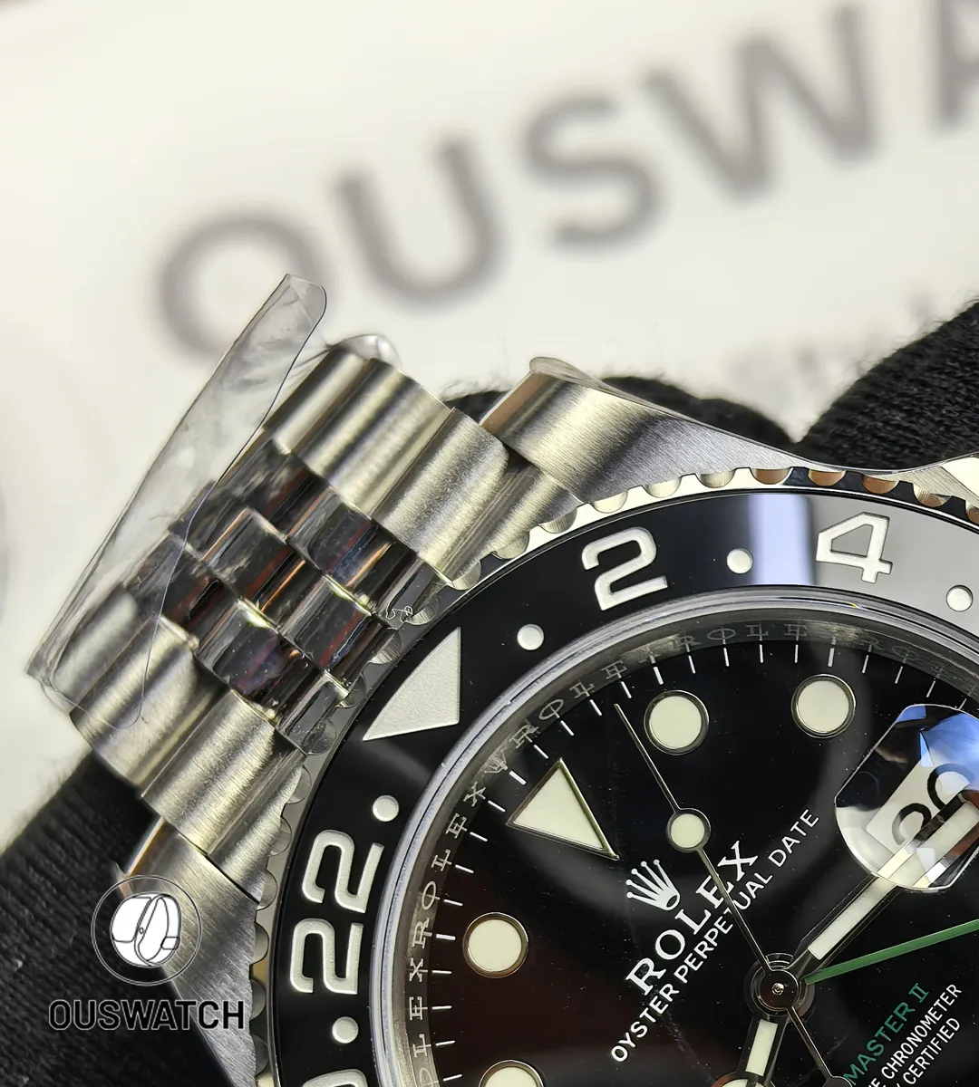 Close-up of the black and grey ceramic bezel on Rolex GMT-Master II 126710GRNR-0003.