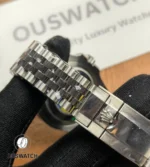 Jubilee bracelet and clasp detail of Rolex GMT-Master II 126710GRNR-0003 showing link finish and folding mechanism.