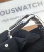 Crown close-up of Rolex Land-Dweller 127334-0001 showing crown logo and guard detail.