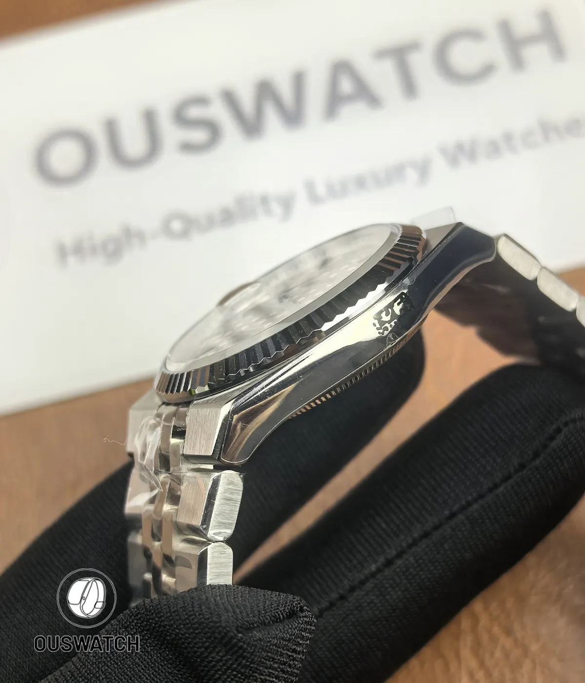 Side profile of Rolex Land-Dweller 127334-0001 showcasing the satin-brushed case finish.