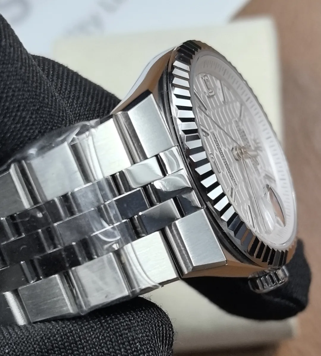 Detail of the bracelet endlink and case junction on Rolex Land-Dweller 127234.
