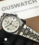 Rolex Land-Dweller 40 127334-0001 white honeycomb dial with Jubilee stainless steel bracelet, full view.