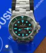 Submariner Hulk 116610LV shown in dim lighting to demonstrate dial depth and lume performance.
